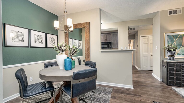 Dining area with modern finishes and chair rail
