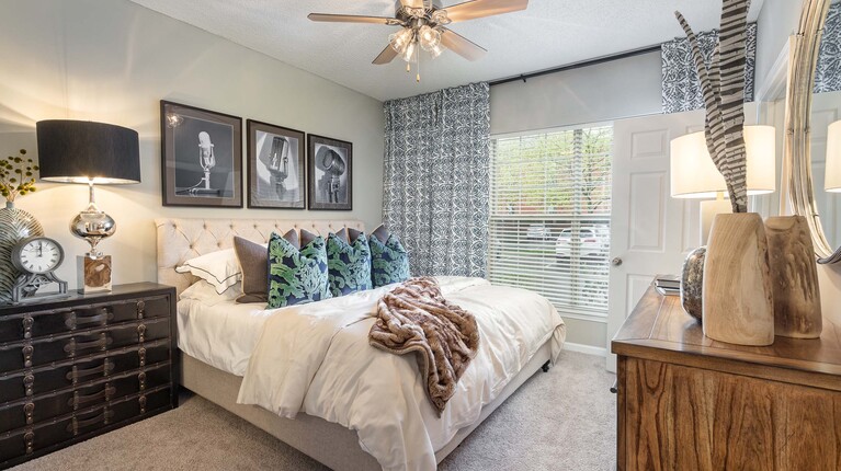 Bright bedroom with ceiling fan