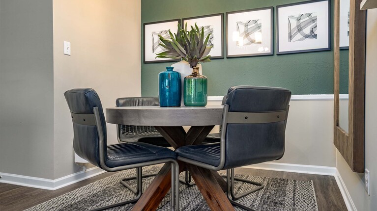 Dining area with modern finishes and chair rail