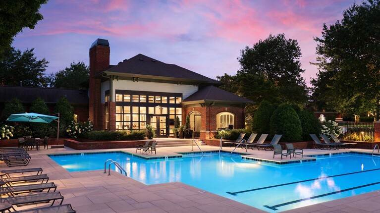Sparkling swimming pool at dusk